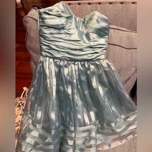 Off shoulder empire waist, flounce dress perfect for prom or that party.